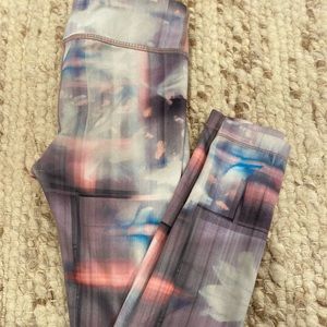 Multi-colored athleta leggings.